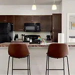The Ladybird: Riverwalk Loft